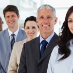 Smiling diverse business team in office