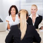 Job interview panel evaluating a candidate